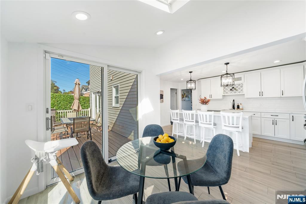25 Glenview Road Nutley, NJ 07110 - Photo 15 of 49 a living room with furniture and a fireplace