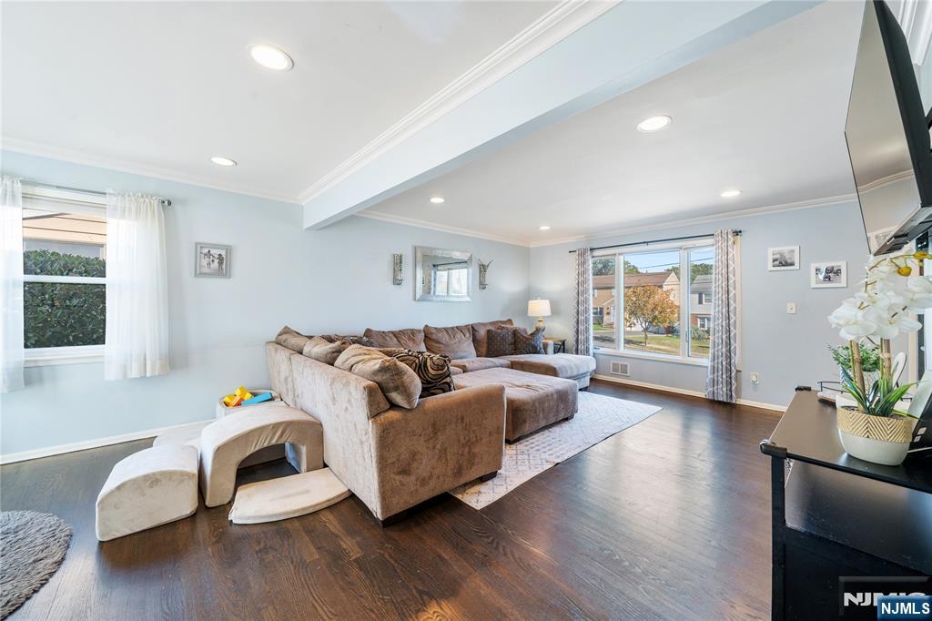 25 Glenview Road Nutley, NJ 07110 - Photo 18 of 49 a living room with furniture and a potted plant