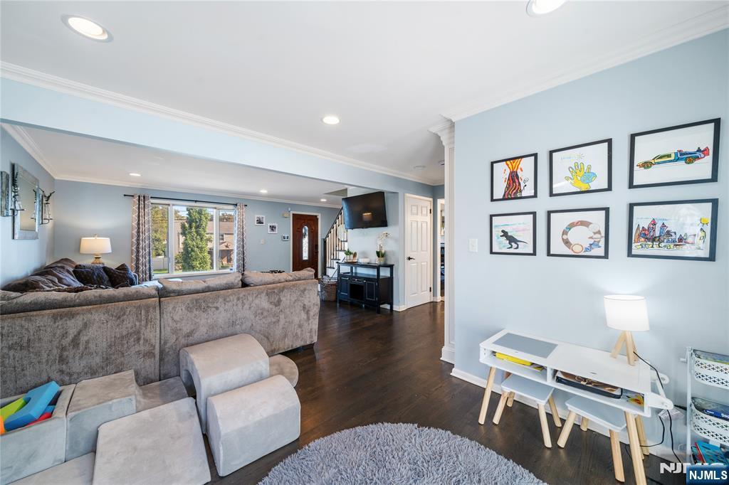 25 Glenview Road Nutley, NJ 07110 - Photo 20 of 49 a living room with furniture and wooden floor