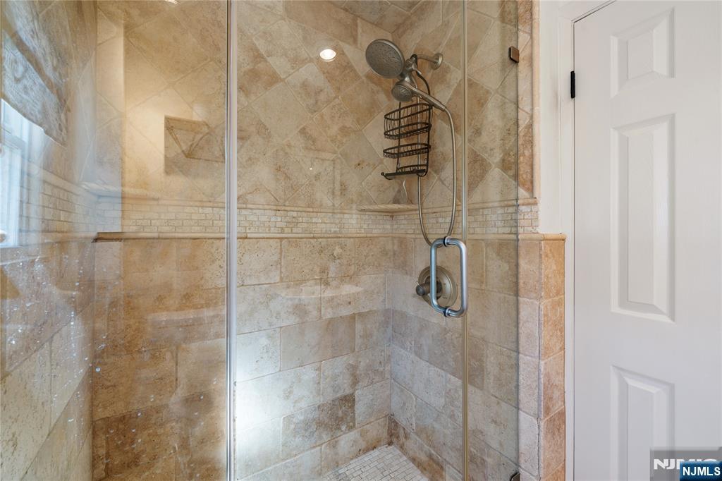 25 Glenview Road Nutley, NJ 07110 - Photo 22 of 49 a bathroom with a shower
