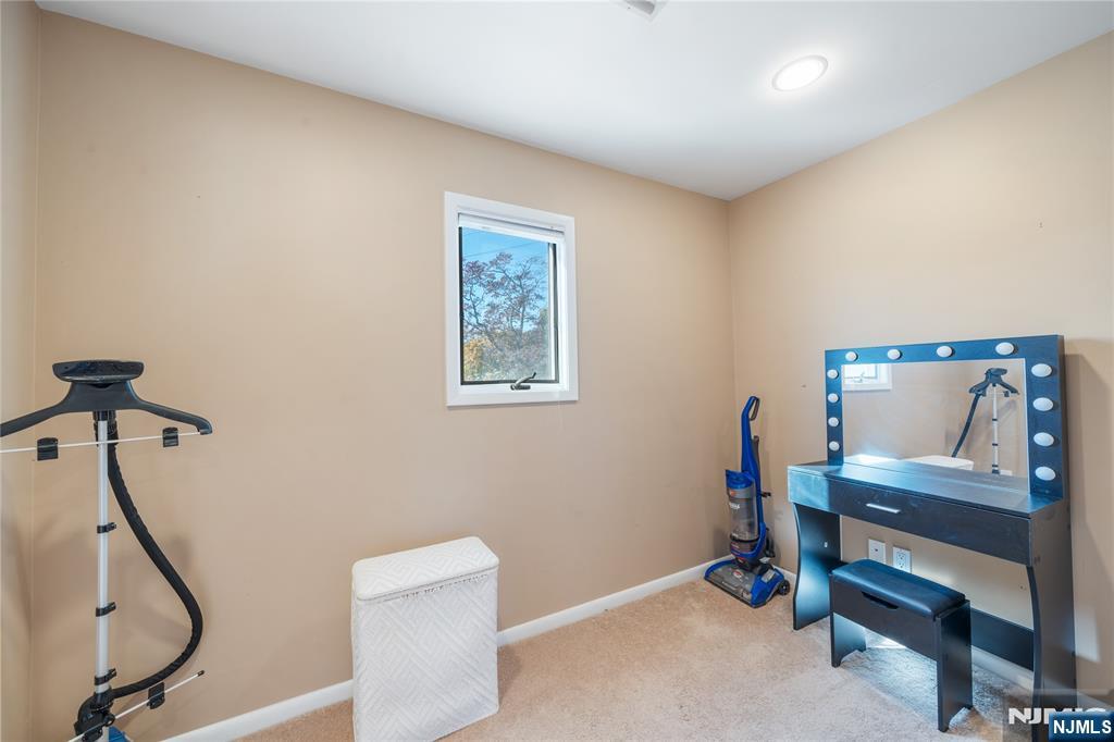 25 Glenview Road Nutley, NJ 07110 - Photo 29 of 49 a bedroom with furniture and a window