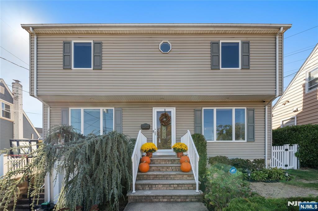 25 Glenview Road Nutley, NJ 07110 - Photo 3 of 49 a front view of building with green space