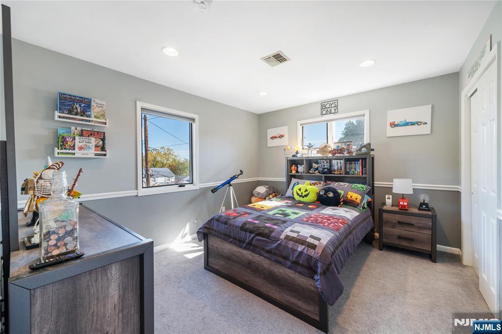 25 Glenview Road Nutley, NJ 07110 - Photo 31 of 49 a bedroom with bed and window