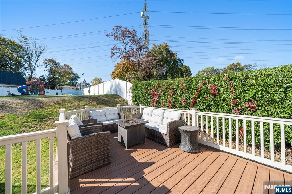 25 Glenview Road Nutley, NJ 07110 - Photo 44 of 49 a view of balcony with furniture and outdoor kitchen