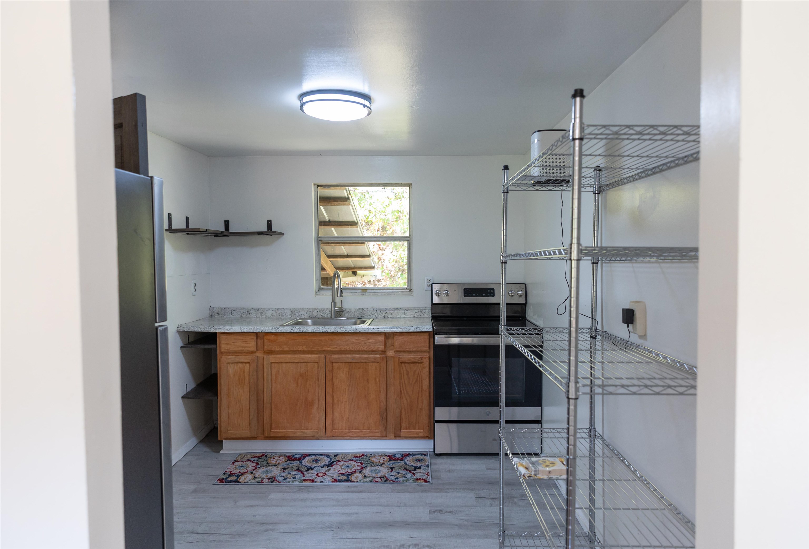 2063 Pedlar River Road Vesuvius, VA 24483 - Photo 12 of 35 a kitchen with a cabinets and appliances