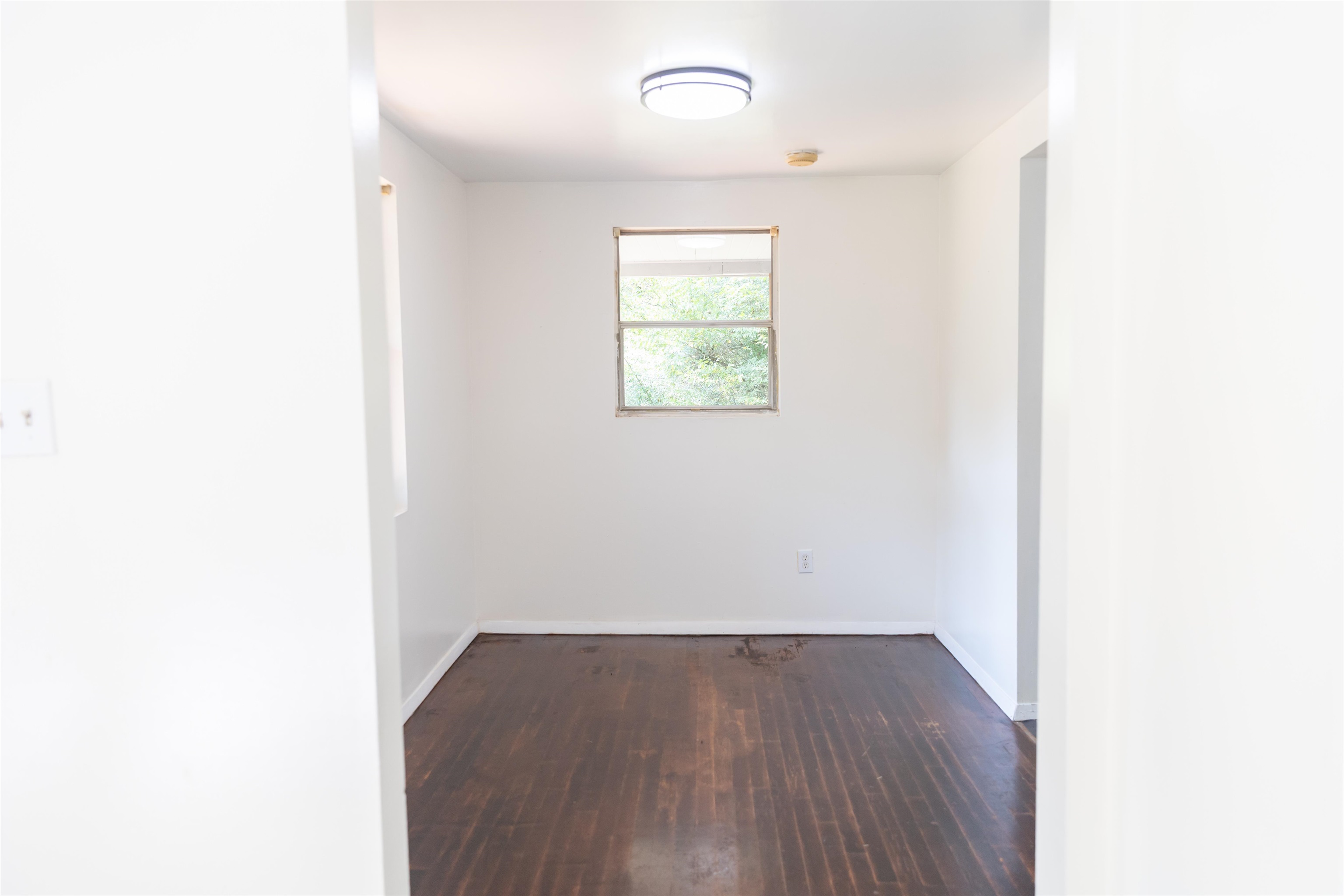 2063 Pedlar River Road Vesuvius, VA 24483 - Photo 17 of 35 a view of an empty room with wooden floor
