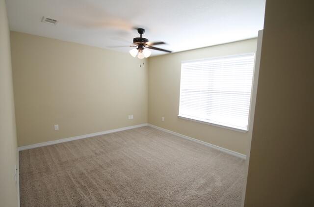 220 Wainwright Drive Crestview, FL 32539 - Photo 11 of 25 a view of an empty room with a window