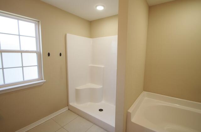 220 Wainwright Drive Crestview, FL 32539 - Photo 19 of 25 a bathroom with a shower and a sink