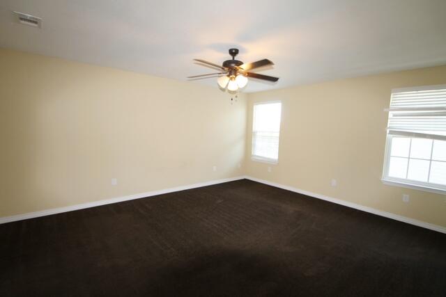 220 Wainwright Drive Crestview, FL 32539 - Photo 8 of 25 a view of an empty room with a window