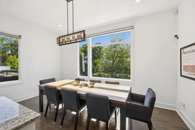 a bathroom with a shower sink and mirror