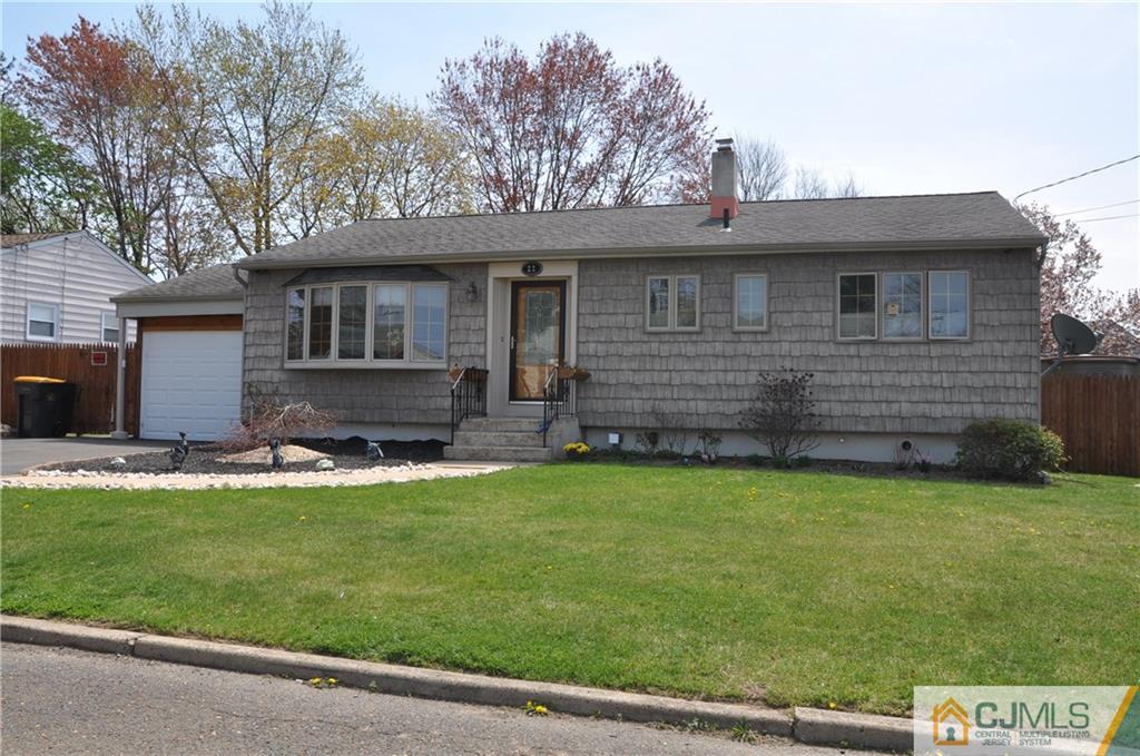 22 Longview Road Old Bridge, NJ 08857 - Photo 1 of 1 a front view of a house with a garden