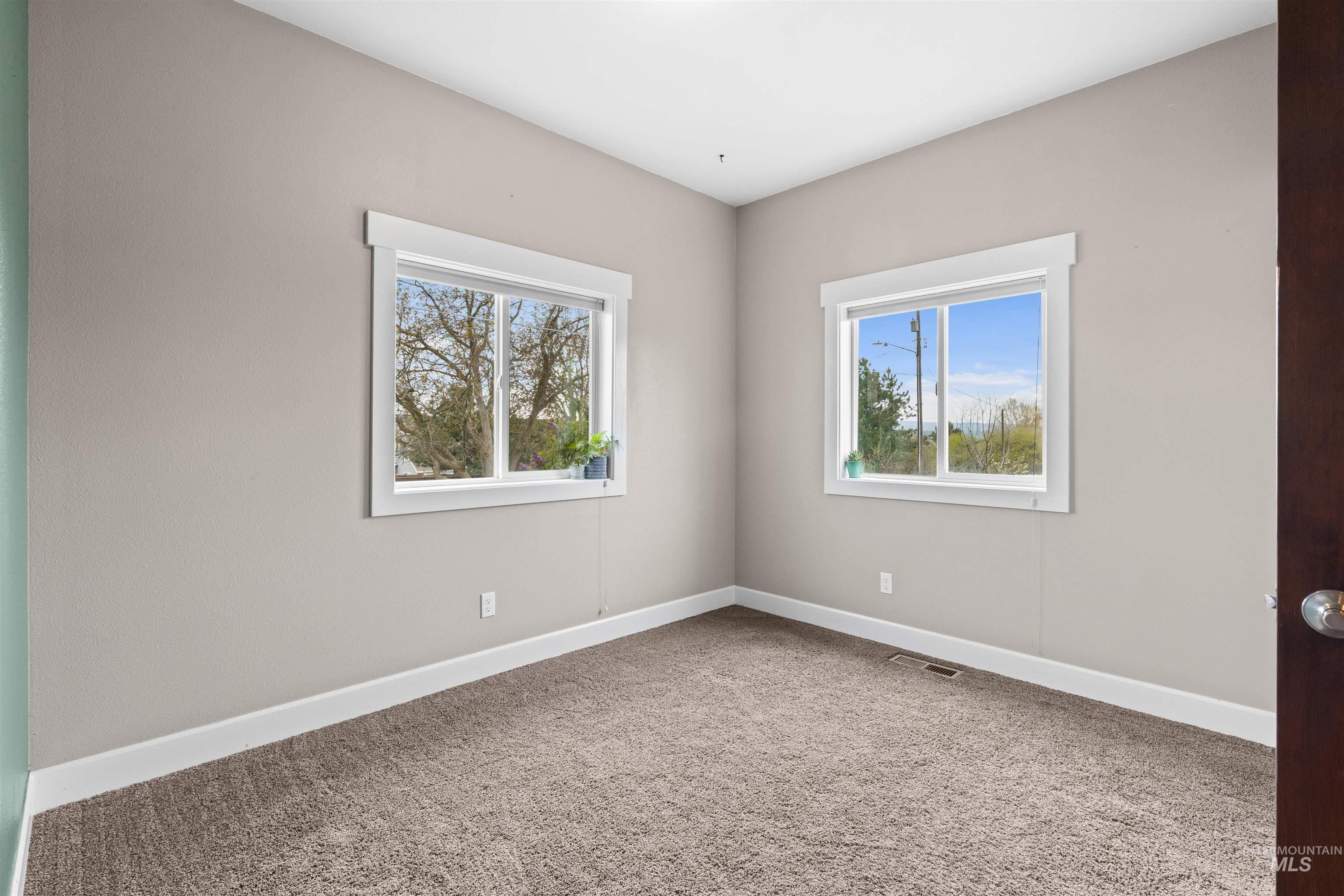 3810 21st Street Lewiston, ID 83501 - Photo 18 of 39 Unfurnished room featuring light carpet and baseboards