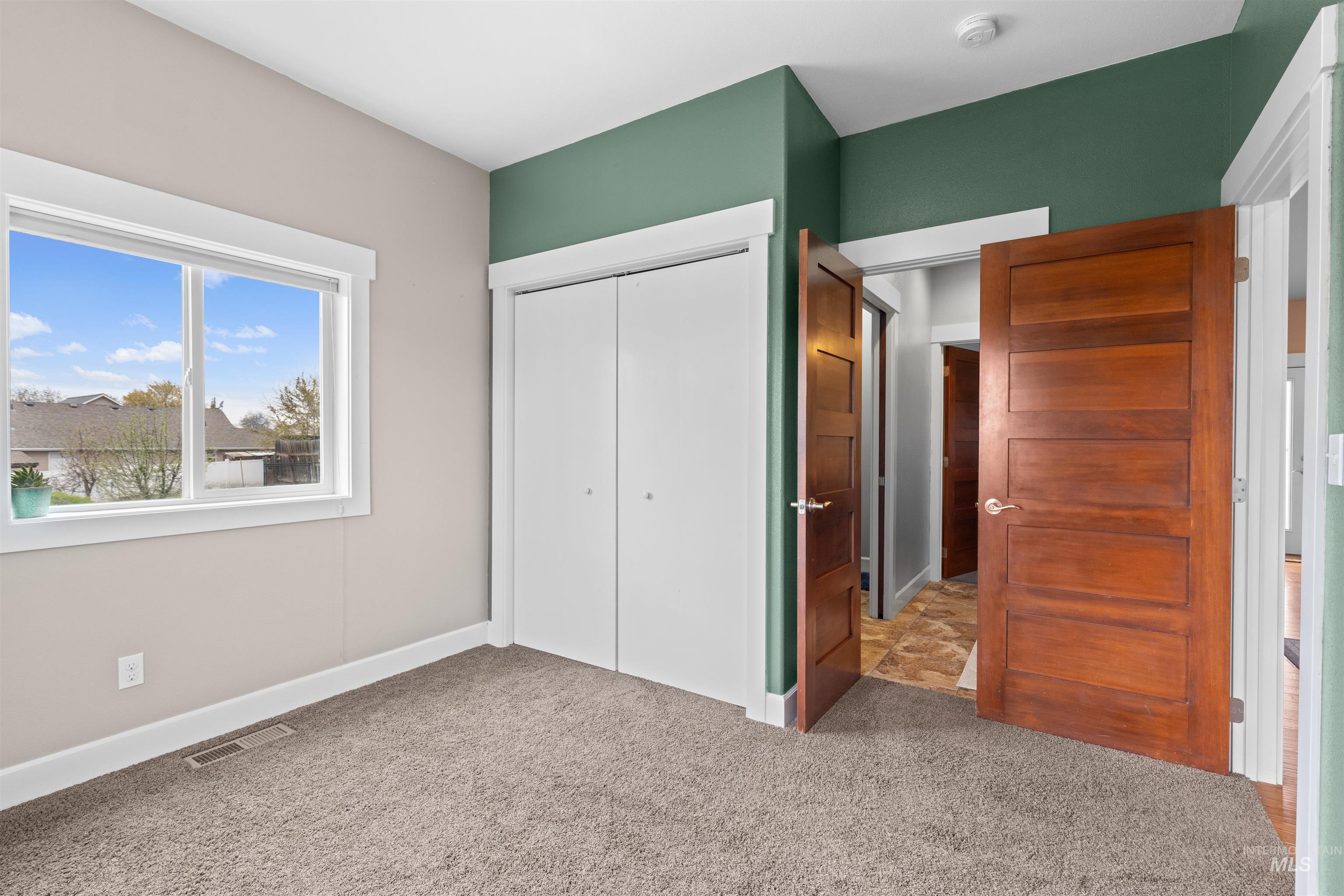 3810 21st Street Lewiston, ID 83501 - Photo 19 of 39 Unfurnished bedroom featuring a closet and light colored carpet
