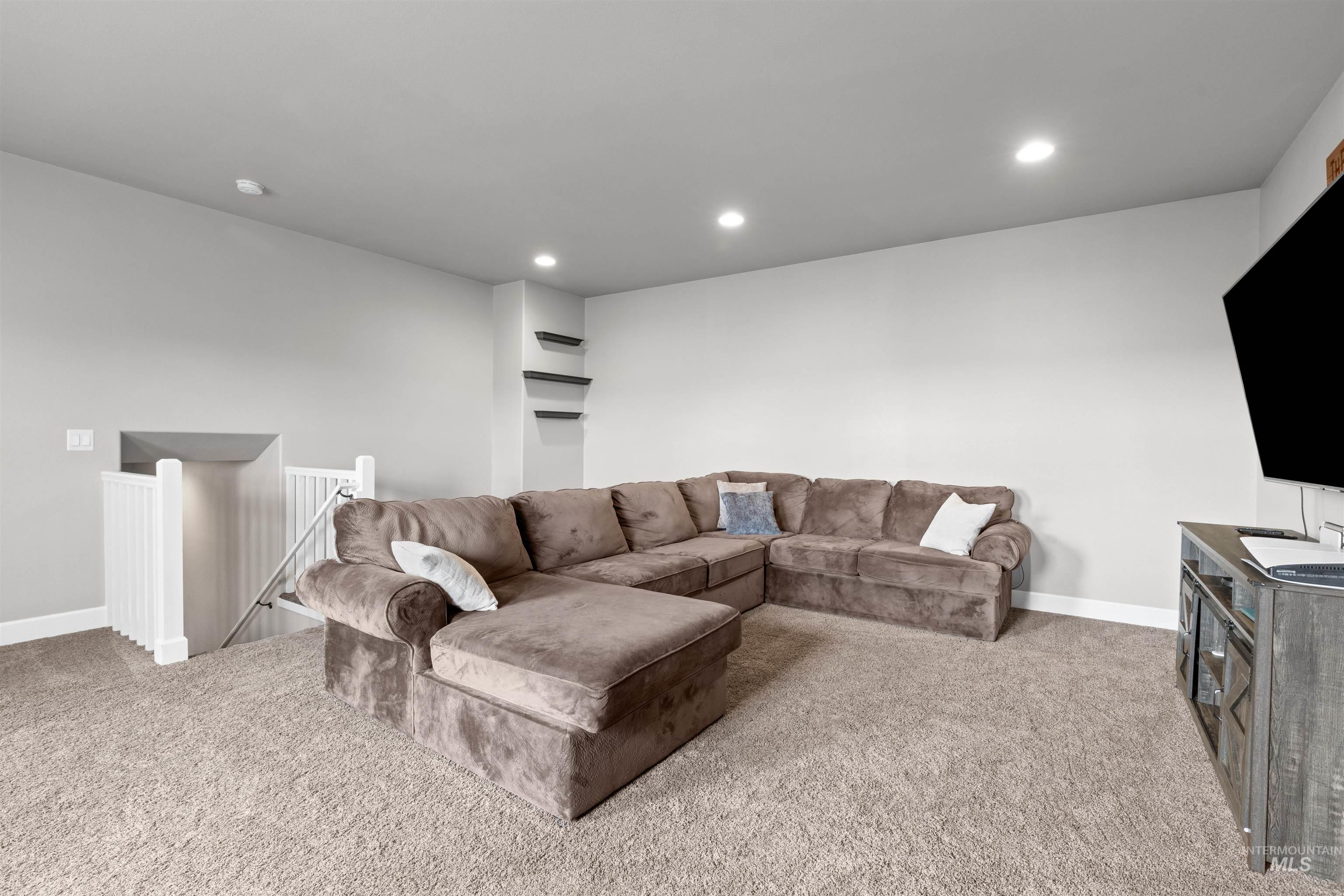 3810 21st Street Lewiston, ID 83501 - Photo 27 of 39 Living room with recessed lighting and light carpet