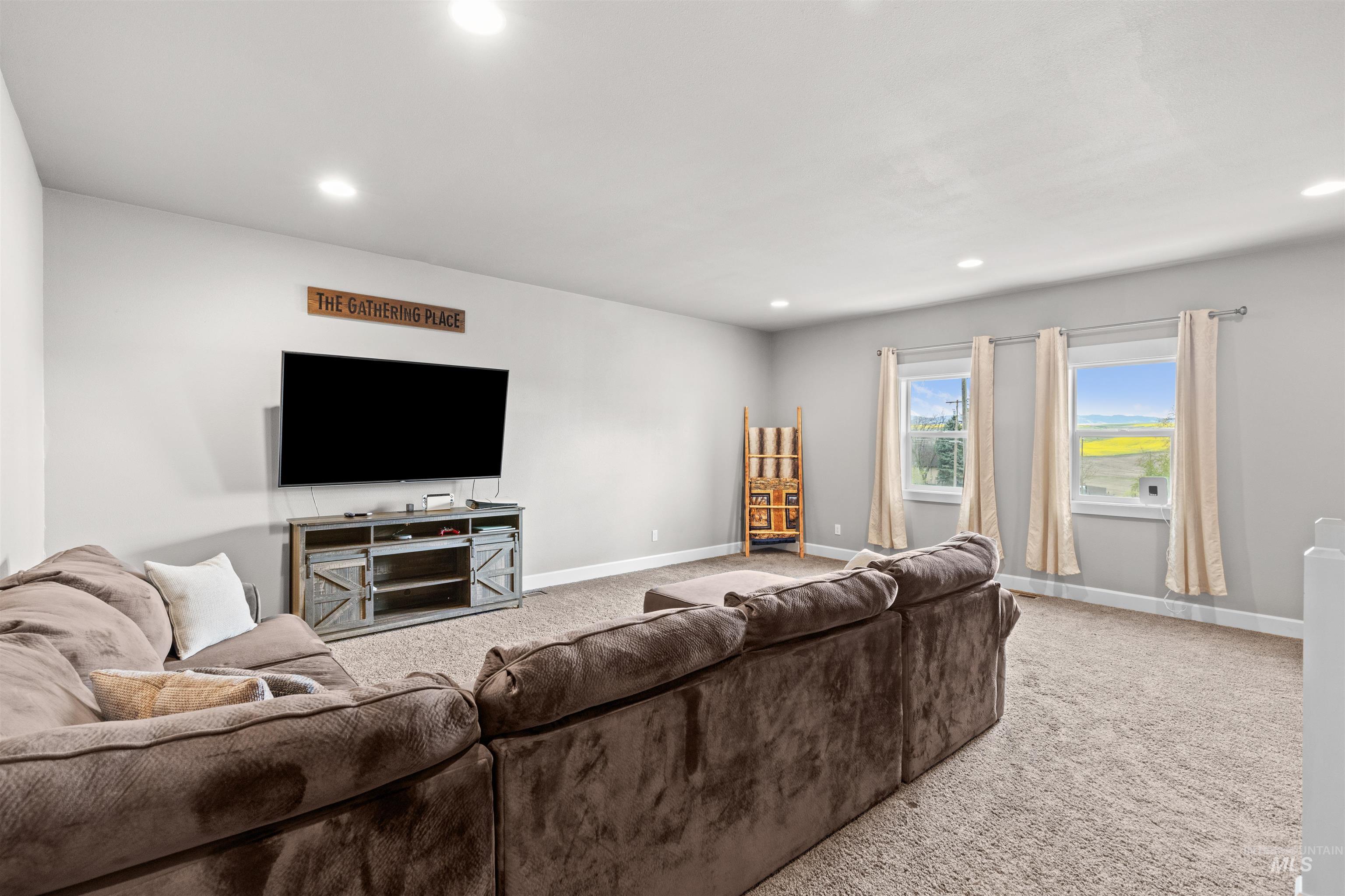 3810 21st Street Lewiston, ID 83501 - Photo 28 of 39 Living room with light colored carpet and recessed lighting