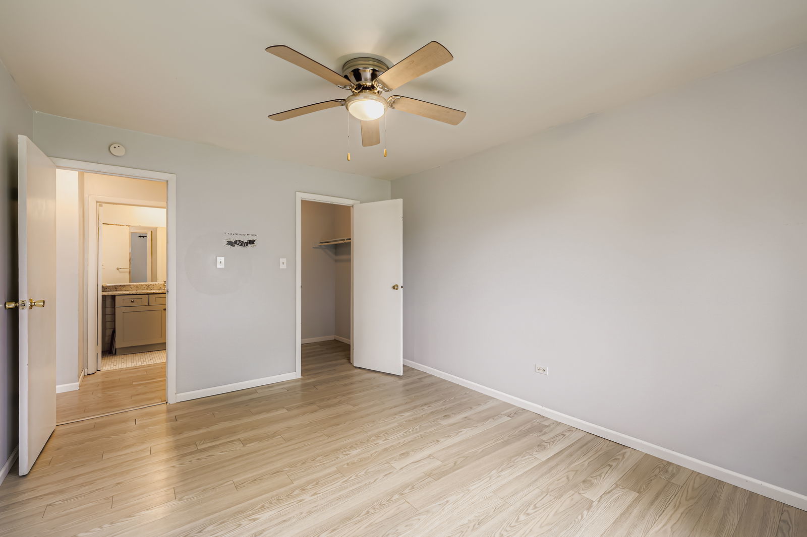 870 Winesap Court, Unit 103 Prospect Heights, IL 60070 - Photo 7 of 11 wooden floor in an empty room