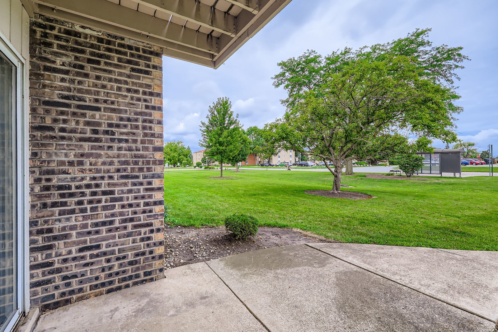 870 Winesap Court, Unit 103 Prospect Heights, IL 60070 - Photo 10 of 11 a view of a building with a yard