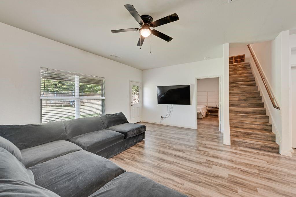 2907 Kyle Street Anna, TX 75409 - Photo 5 of 25 a living room with furniture and a flat screen tv