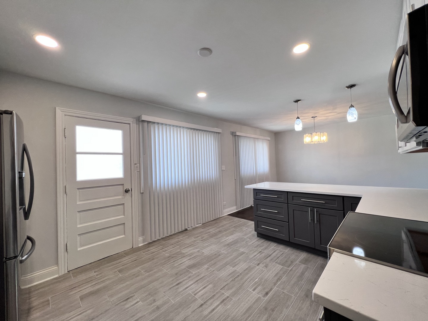 235 North Rohlwing Road Palatine, IL 60074 - Photo 13 of 35 a room with a bed and a television