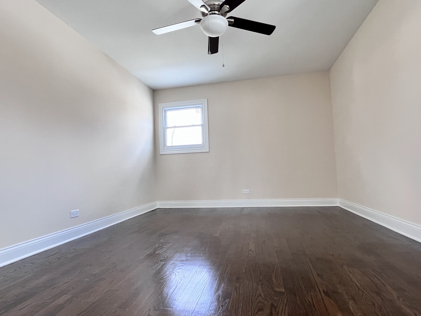 235 North Rohlwing Road Palatine, IL 60074 - Photo 23 of 35 wooden floor in an empty room with a window