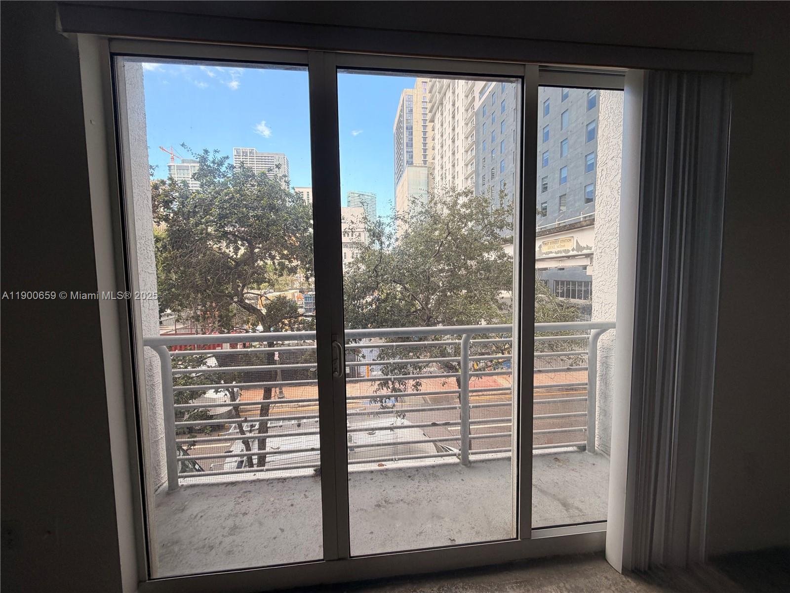 133 Northeast 2nd Avenue, Unit 209 Miami, FL 33132 - Photo 2 of 20 a view of a large window with an outdoor view