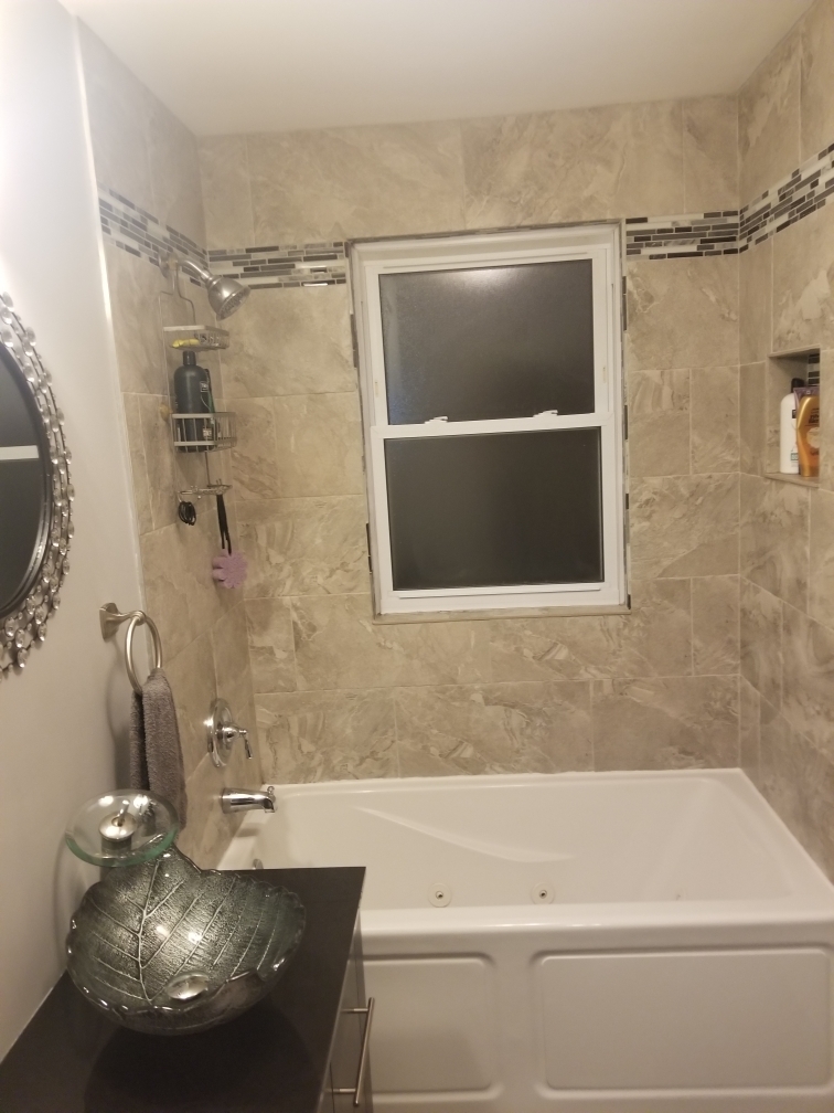 6110 Birmingham Street Chicago Ridge, IL 60415 - Photo 17 of 20 a bathroom with a sink and a mirror