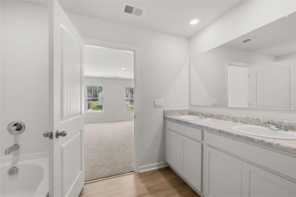 509 Oak View Lane Dallas, GA 30157 - Photo 23 of 35 a bathroom with a sink and a mirror