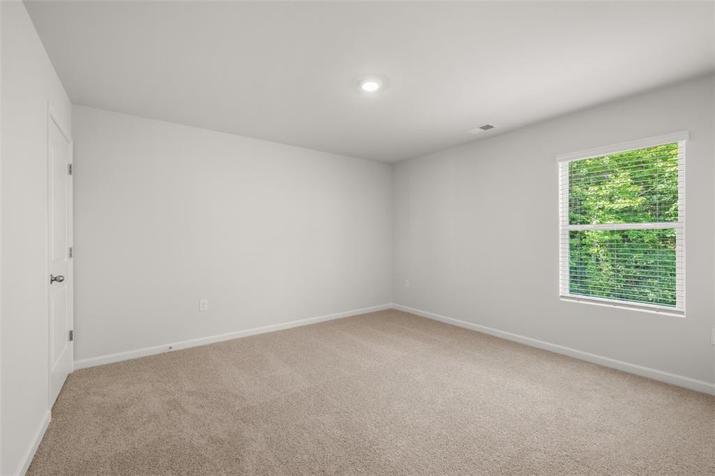 509 Oak View Lane Dallas, GA 30157 - Photo 28 of 35 a view of an empty room with a window