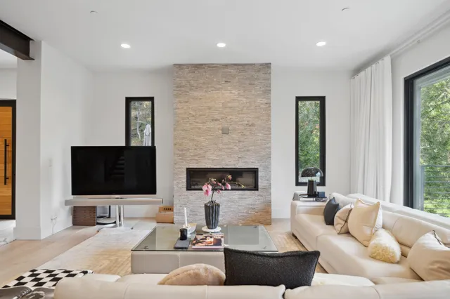 a bathroom with a bathtub and a sink