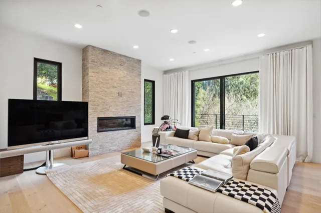 a view of a livingroom with furniture and window