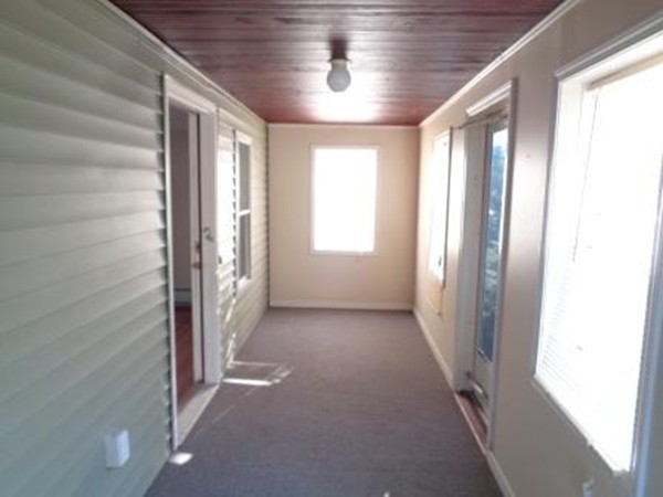 113 Bourne Street Three Rivers, MA 01080 - Photo 8 of 19 a view of a hallway with windows