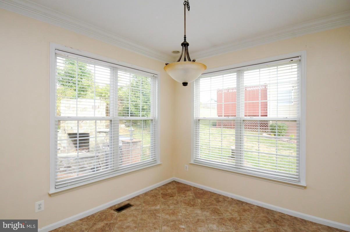 17616 Overlook Road Dumfries, VA 22026 - Photo 14 of 30 a view of an empty room with a window