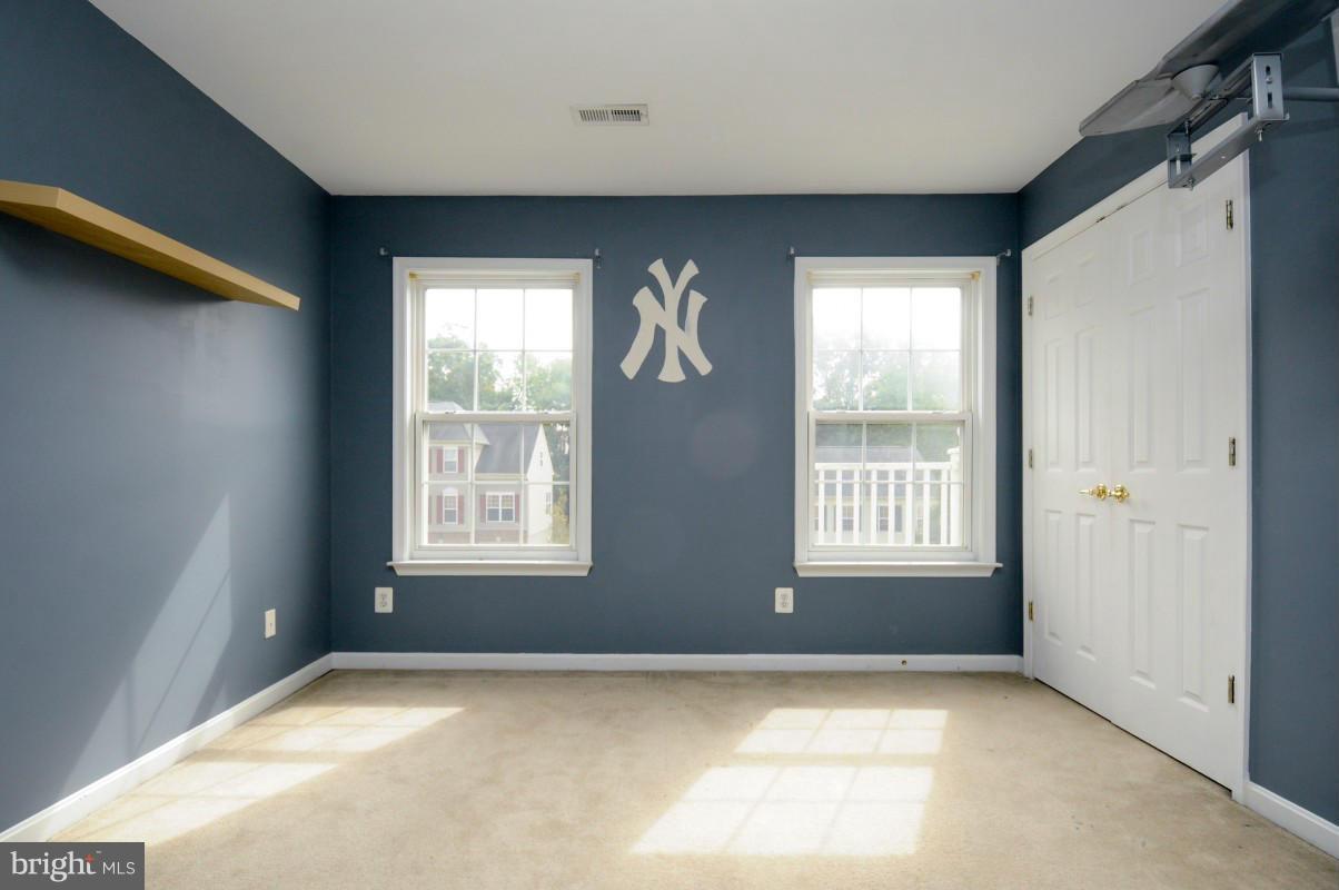 17616 Overlook Road Dumfries, VA 22026 - Photo 17 of 30 an empty room with windows
