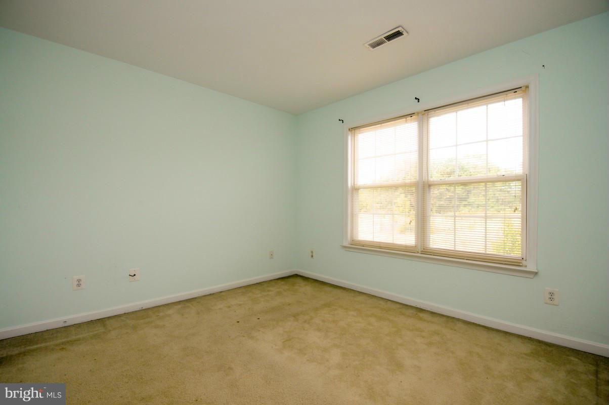 17616 Overlook Road Dumfries, VA 22026 - Photo 18 of 30 an empty room with a window