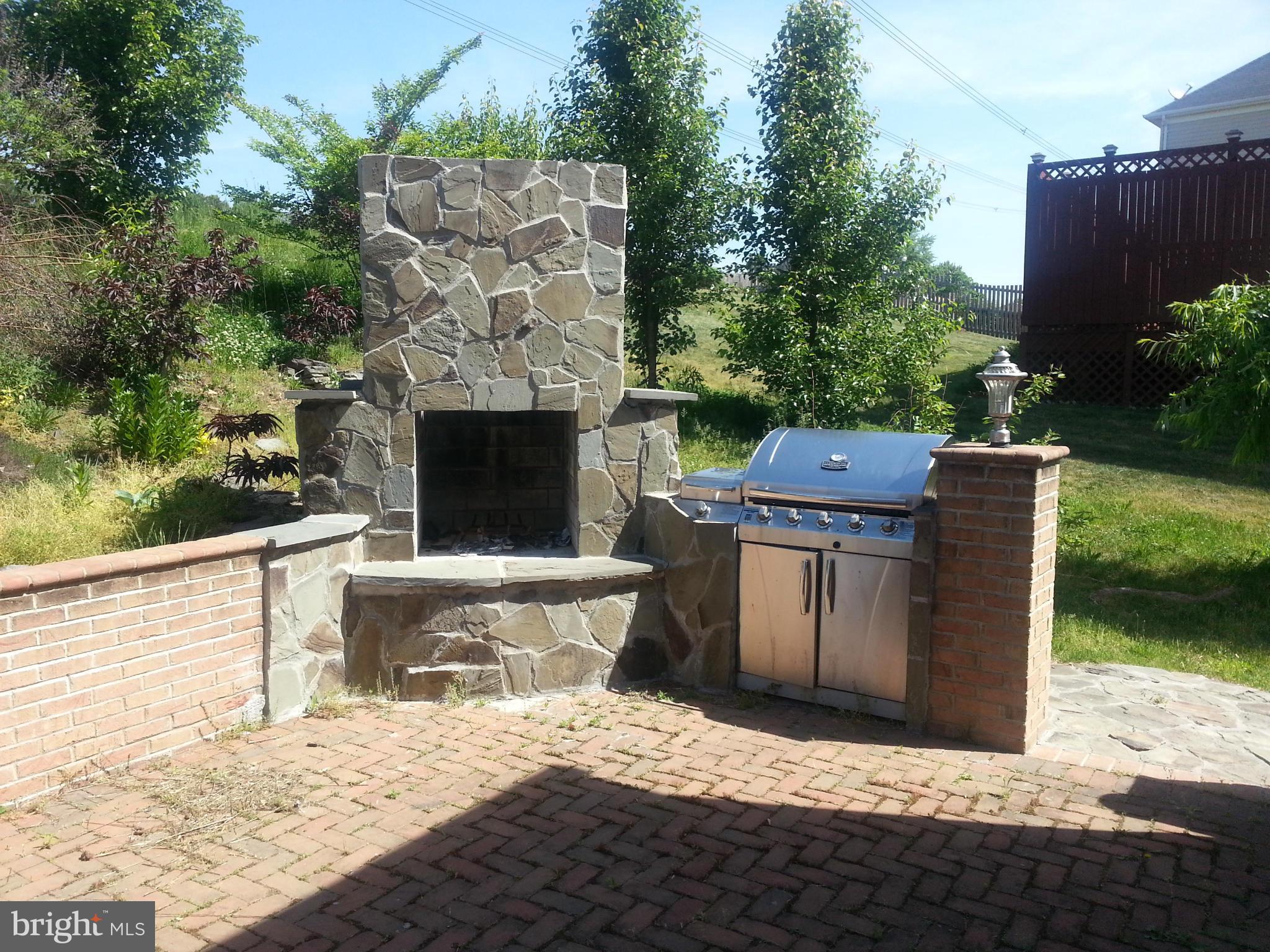 17616 Overlook Road Dumfries, VA 22026 - Photo 3 of 30 a outdoor view with a fireplace