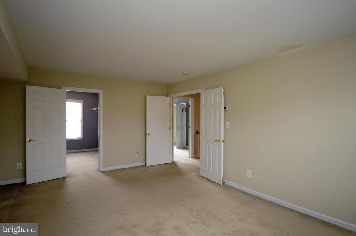 17616 Overlook Road Dumfries, VA 22026 - Photo 21 of 30 an empty room with closet