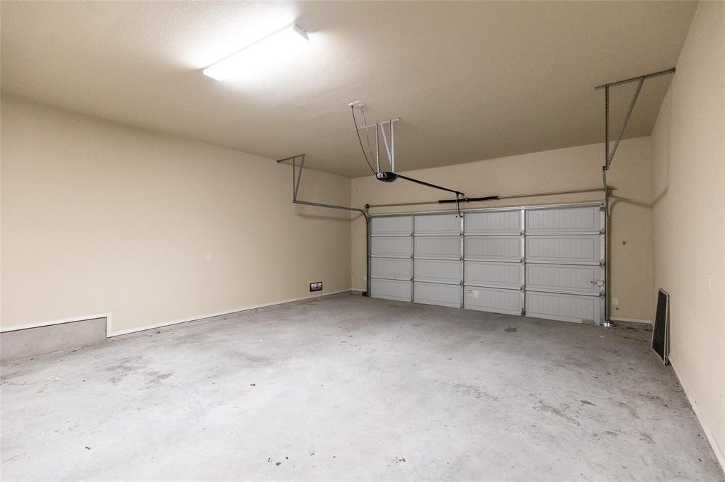 515 Jack Rabbit Lane, Unit A Buda, TX 78610 - Photo 13 of 16 a view of a garage