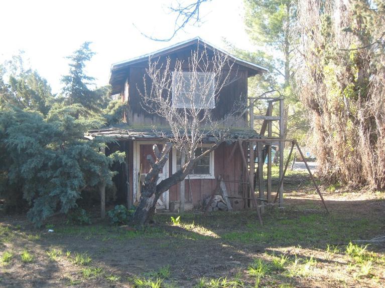 14 Burnham Road Oak View, CA 93022 - Photo 8 of 9 a view of a wooden house with a yard