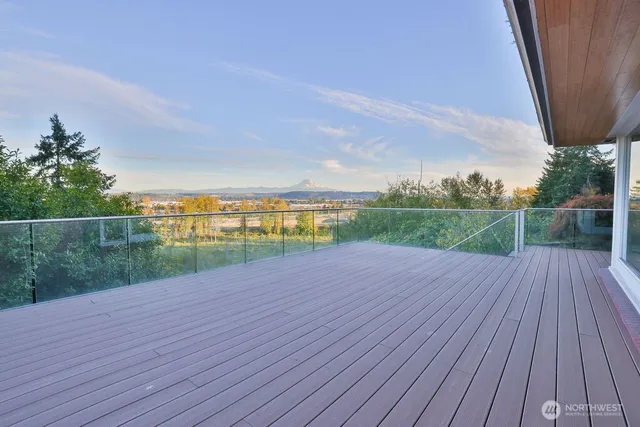 a view of a house on a deck