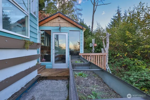 a view of a house with a yard and garage