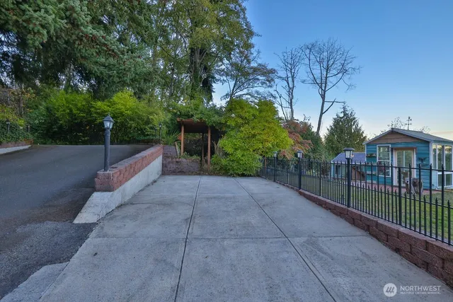 a view of a house with small yard