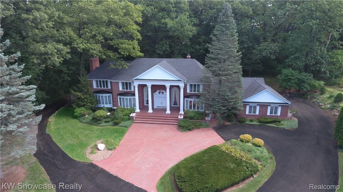 1900 East Vly Road Bloomfield Hills, MI 48304 - Photo 1 of 68 Beautiful Georgian-style private home located in Donnelly Farm Sub - Adjacent to Bloomfield Hills Country Club and minutes to Cranbrook Schools.