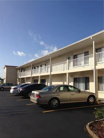 a car parked in front of a building