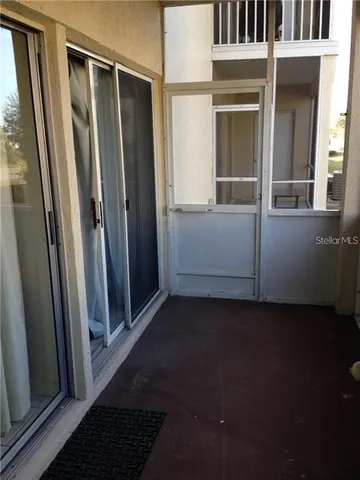 a view of a livingroom and window