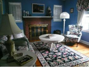 41 Dalhousie Road Waynesboro, VA 22980 - Photo 3 of 7 a kitchen with a table and a fireplace