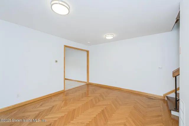 a view of a car park in front of house