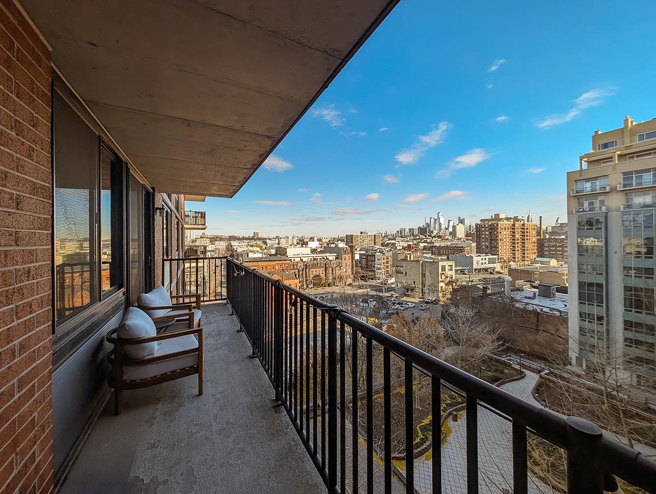 700 Grove Street, Unit 10A Jersey City, NJ 07310 - Photo 1 of 24 a view of city from balcony