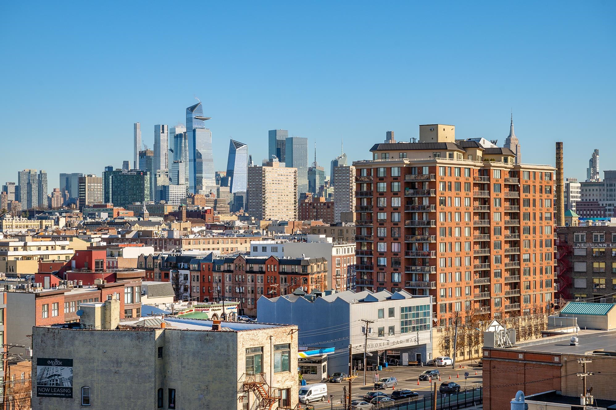 700 Grove Street, Unit 10A Jersey City, NJ 07310 - Photo 11 of 24 a city view with tall buildings