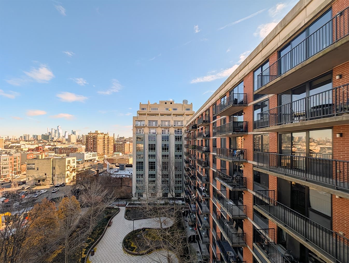 700 Grove Street, Unit 10A Jersey City, NJ 07310 - Photo 15 of 24 a city view with tall buildings
