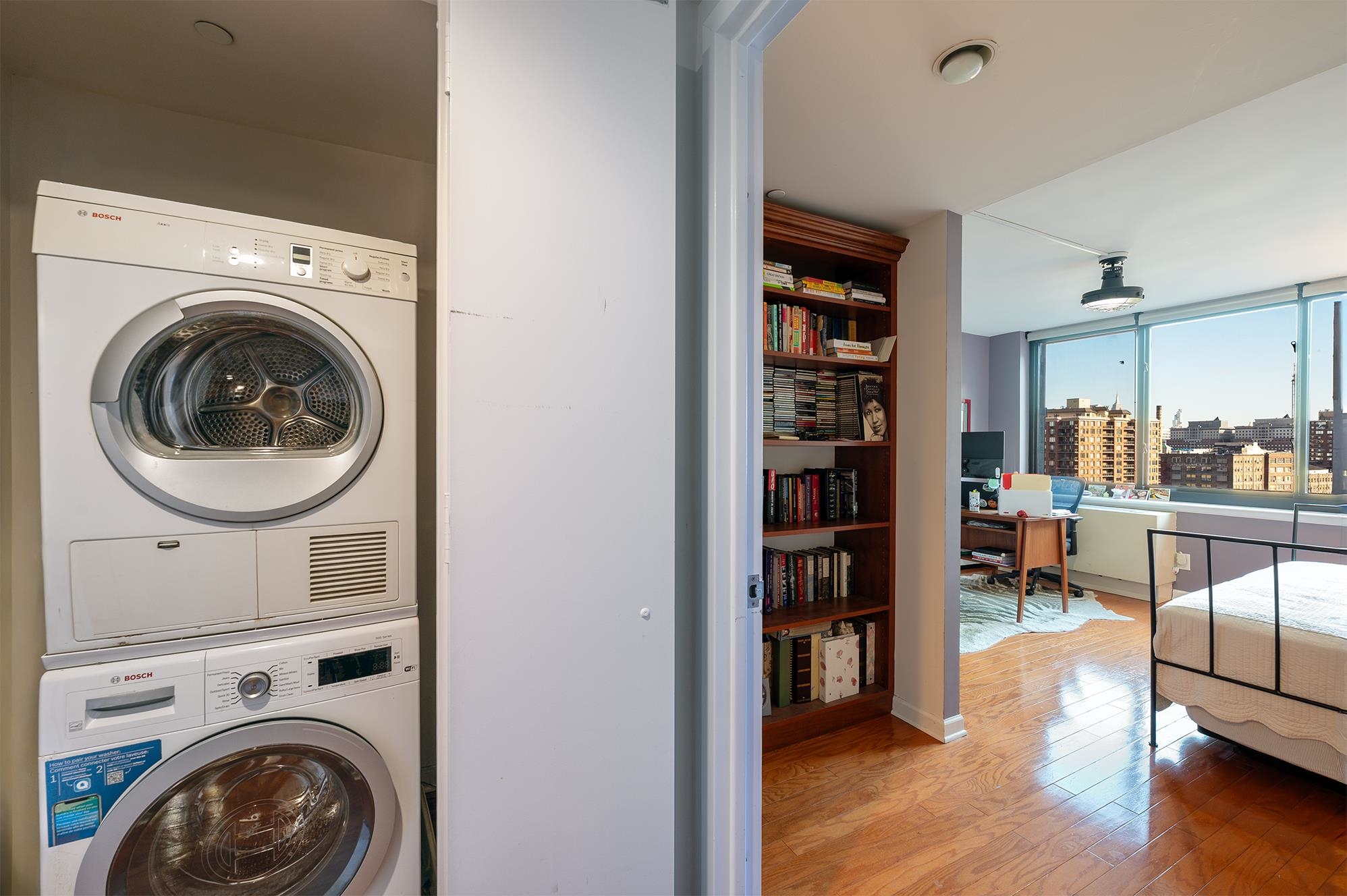 700 Grove Street, Unit 10A Jersey City, NJ 07310 - Photo 18 of 24 a view of a storage & utility room with washer and dryer